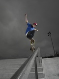 Skateboarder Performing Tricks Photographic Print