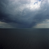 Overcast Sky Over Ocean Photographic Print