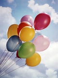 Bunch Of Multicolored Balloons In Blue Sky With White Clouds Photographic Print by H. Armstrong Roberts
