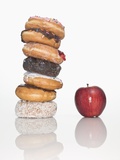 Stack of Donuts and One Apple Photographic Print