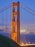 Tower of Golden Gate Bridge and San Francisco at Dusk Photographic Print by Julie Eggers