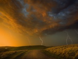Thunderstorm and Orange Clouds at Sunset Photographic Print by Jonathan Hicks