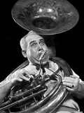 1940s Chubby Man Musician With Polka Dot Bow Tie And Bulging Eyes Playing A Sousaphone Photographic Print by H. Armstrong Roberts