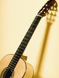 Guitar Leaning Against Wall Photographic Print by Jed Share and Kaoru