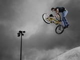 BMX Biker Performing Tricks Photographic Print