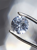 Diamond Held by Tweezers Photographic Print