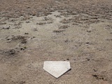 Home Plate on Field of Dirt and Dead Grass Photographic Print by Jim Vecchi