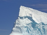 Pointy Blue Iceberg Sculpted by Waves Photographic Print by John and Yva Eastcott And Momatiuk
