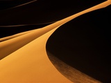 Sand Dunes Bathed in Evening Sunlight Photographic Print by Kazuyoshi Nomachi