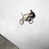 BMX Biker Performing Tricks Photographic Print