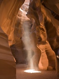 Ray of Sunlight on the Floor of Antelope Canyon Photographic Print by Richard Nowitz