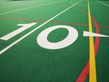 Ten Yard Maker on Football Field Photographic Print by David Papazian