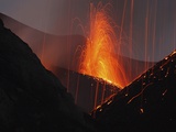 Molten lava erupts from Stromboli  Sicily Photographic Print by Martin Rietze