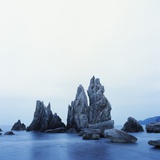Dramatically Shaped Sea Stacks in Ocean Photographic Print by Micha Pawlitzki