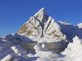 Klokketinden peak in new snow in the Lofoten Islands Photographic Print by Frank Krahmer
