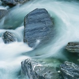 Rushing water and rocks on South Island, New Zealand Photographic Print by Micha Pawlitzki