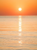 Sunlight Reflecting on Ocean at Sunset Photographic Print by Frank Lukasseck