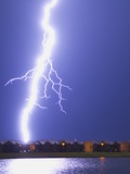 Lightning Striking an Apartment Complex Photographic Print by Jim Reed
