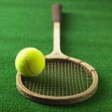 Tennis racket and tennis ball Photographic Print