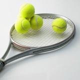 A Tennis Racket and Balls Photographic Print