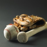 Baseball glove, a bat, and a ball Fotografie-Druck