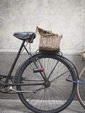 Bicycle with weathered basket Photographic Print by Jenny Elia Pfeiffer