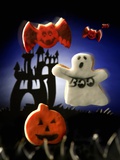 Halloween biscuits (pumpkin, ghost and bats) Photographic Print by Huw Jones