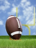 Football and field goal Photographic Print by Gaetano 