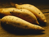 Yams on Wooden Table Photographic Print by Ed Nano