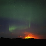 Aurora Borealis over eruption at Eyjafjallajokull glacier Photographic Print