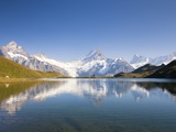 Wetterhorn , Schreckhorn and Finsteraarhorn reflecting in Lake Bachalp Photographic Print by Frank Lukasseck