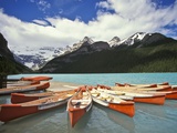 Canoes on Lake Louise Photographic Print by Richard Nowitz