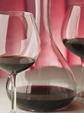 Red wine glasses and decanter Photographic Print