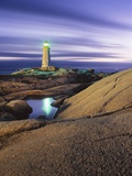 Peggy's Cove Lighthouse, Nova Scotia, Canada. Photographie par Darwin Wiggett