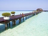 Boardwalk and bungalow by a lagoon in the Maldives Photographic Print by Frank Lukasseck