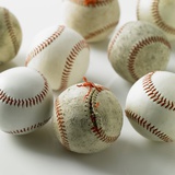 Old and new baseballs gathered together Photographic Print