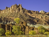 Castle and Fluted Wall Formations in Capitol Reef National Park Photographic Print by John Eastcott & Yva Momatiuk