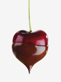 Heart cherry dipped in chocolate sauce Fotografie-Druck