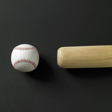 Directly-above view of a bat and a ball in a row Photographic Print