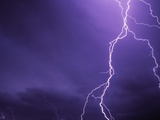 Lightning Bolts Above Colorado at Night Photographic Print by Paul Souders