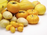 Stack of different kinds of yellow fruits and vegetables Photographic Print