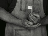 Man Holding Small American Flag Photographic Print by Bob Rowan