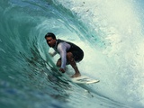 Professional Surfer Riding a Wave Photographic Print by Rick Doyle