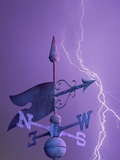 Weathervane and Lightning Bolt Photographic Print by L. Clarke