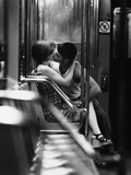 Passionate Couple Kissing in a Subway Car Photographie par Matthew Alan