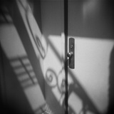 Door and Shadow Photographic Print by David Roseburg