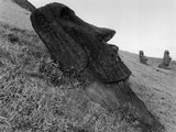 Moai Lying on the Ground Photographic Print by Chris Rainier