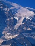Snow Covered peak of Mount Rainier in the Cascade Mountain Range Photographic Print by Paul Souders