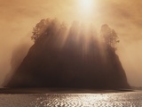 Sun Beams Breaking through Fog over Sea Stack Fotografie-Druck von James Randklev