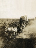 Covered Wagons on the Plains Going West Photographie par Bettmann 
